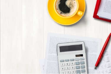 Calculator Coffee On A Table