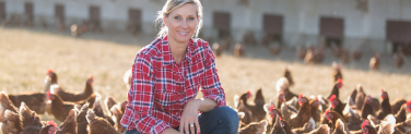 Chicken farmer with chickens
