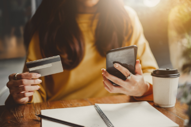 Woman-Browsing-WIth-Cred-Card Woman-Browsing-WIth-Cred-Card